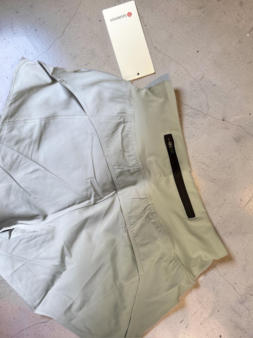 Lululemon Light gray  Athletic Shorts with Back Zip Pocket. These are size small